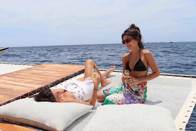 4-in-1 • Gili Islands Snorkel & Sunset Half-day Catamaran Cruise - Sunset dinner in the middle of the ocean: the best seat in the house