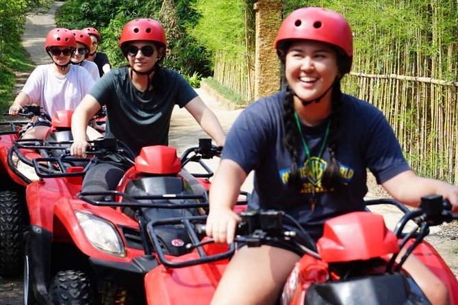 Bali ATV Quad Bike and Snorkeling at Blue Lagoon Tanjung Jepun Combination Tour - ATV quad biking in Ubud countryside: mud, river, cave, and hills