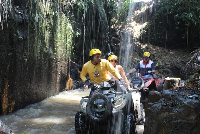Bali Atv Riding through Cave and Waterfall - Getting suited up: helmets, gum boots, and a real 250cc quad
