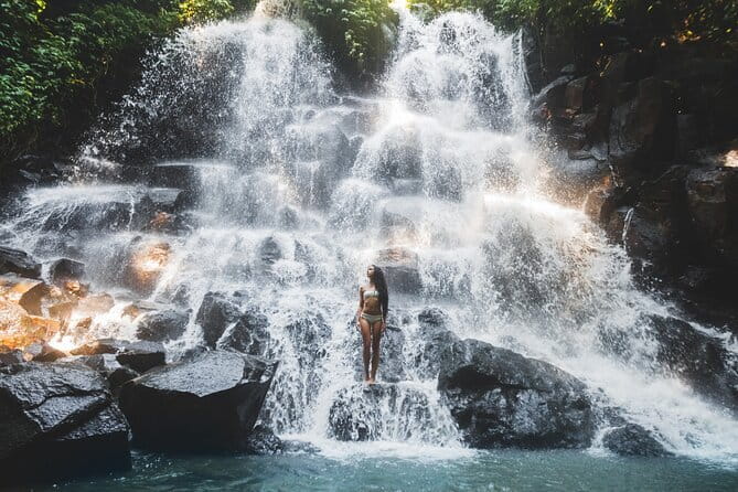 Best Of Ubud Waterfalls, Rice Terrace and Jungle Swing Tour - Tukad Cepung Waterfall: Cave Canyon Light and Shallow Pool Magic