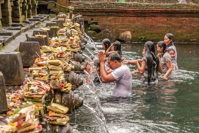 Exclusive Ubud Experience: Nature, Culture & Adventure in One Day - Tirta Empul temple, holy water rituals, and respectful focus