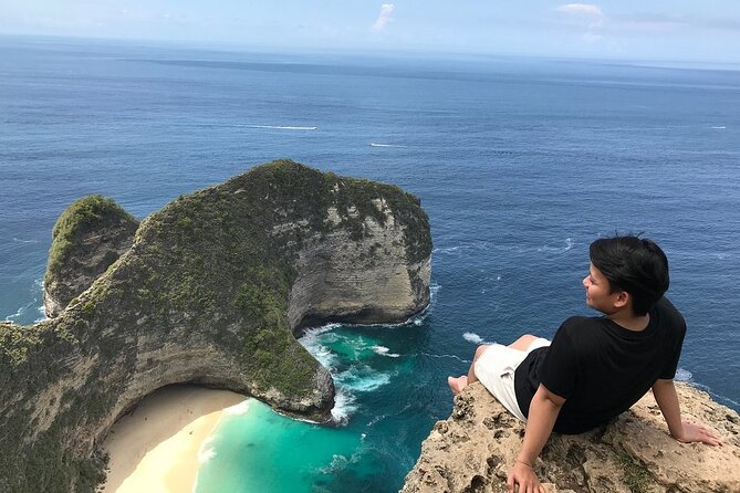Fast Boat Transfer: Sanur to Nusa Penida by Penidago - Nusa Penida landing during harbor work: plan for wet feet and uneven steps