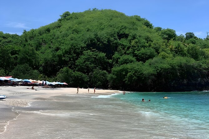 Full Day Nusa Penida Island Beach Tour From Bali - Stop 1: Angel’s Billabong and the Rock-Lagoon Look