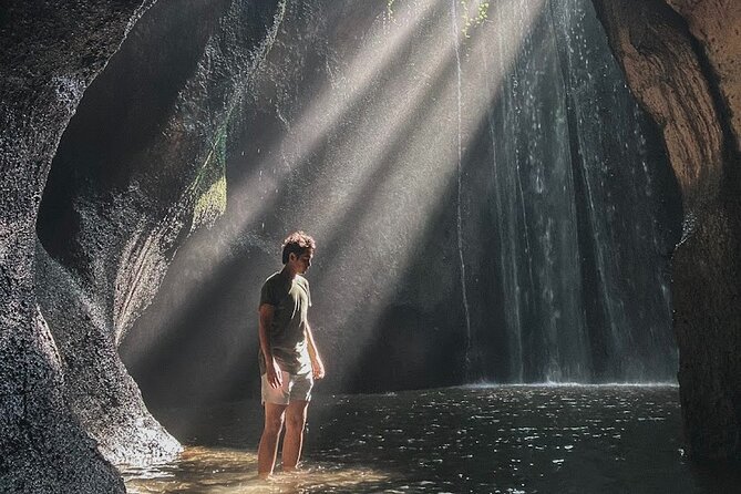 Full Day Private Bali Best Instagram Tour - Tirta Gangga Water Palace: statues, water, and cool air
