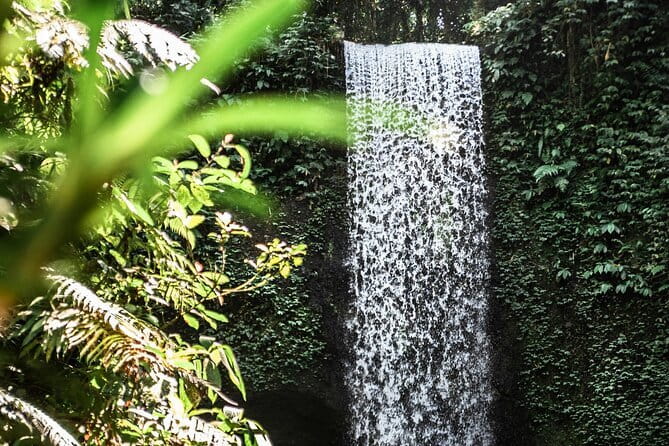 Full Day Private Tour All Inclusive Hidden Gems Bali Waterfall - Tibumana Waterfall: the cave-like illusion from tilted cliffs