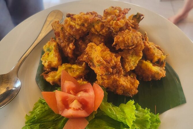 Full Day Ubud Waterfall Visit and Cooking Experience - Traditional market stop for ingredient spotting (and when rain can change it)