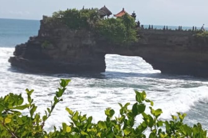 Half Day Tanah Lot Temple Private Guided Tour - Stop 1: Taman Ayun Temple and the calm water-garden mood