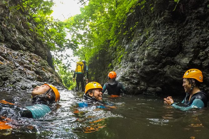 Intermediate canyoning tour in Bali " Maboya Canyon " - The Descent: Slides, Jumps, and Rappels in an Intermediate Run