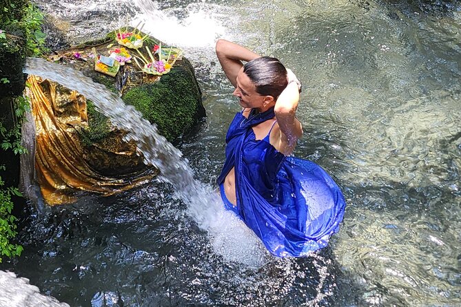 Melukat Purification Ceremony at Mengening Temple - The ceremony flow at Mengening Temple, prayers, offerings, then the bath