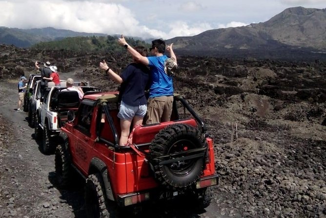 Mount Batur Jeep Sunrise & Overnight Glamping Experience - No-hike sunrise, then black lava and sand fields