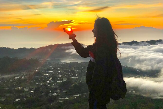 Mount Batur Sunrise Trekking and Hidden Waterfall - The sunrise hike: flashlight steps, poles, and pacing smart