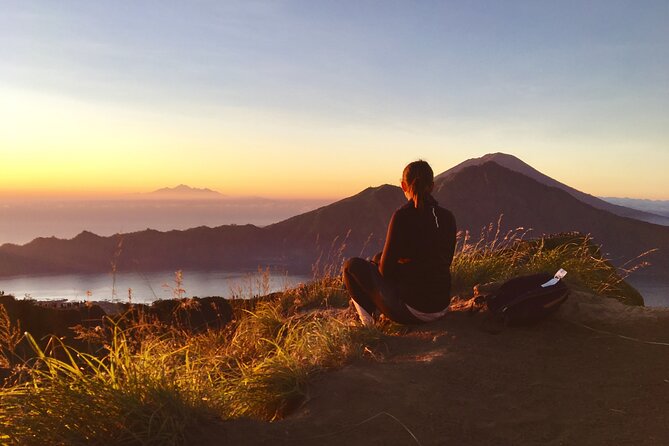 Mount Batur Sunrise Trekking and Natural Hot Spring Tour - Sunrise at the summit: sky colors, plus the volcano’s strange charm