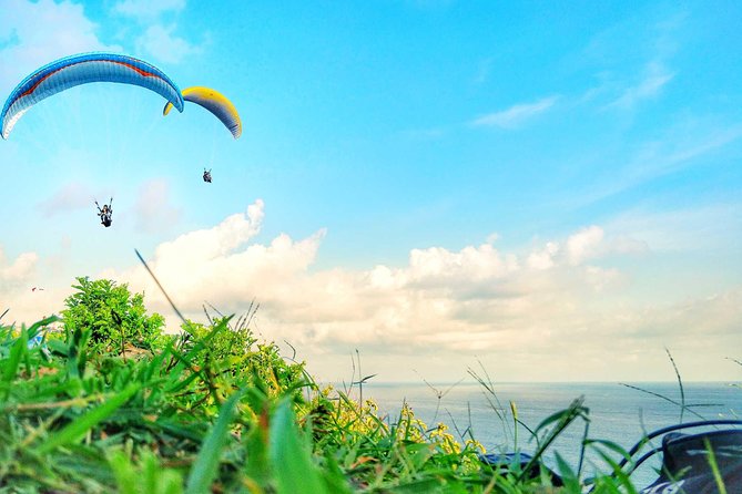 Paragliding Bali Nusa Dua cliff with Free Photo/Videos - The 15-minute tandem flight that makes Bali look different fast