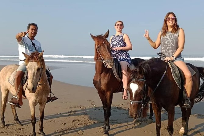 Private Bali Horse Riding In Seminyak Beach - Pantai Double Six stop: surfers nearby and a natural photo moment
