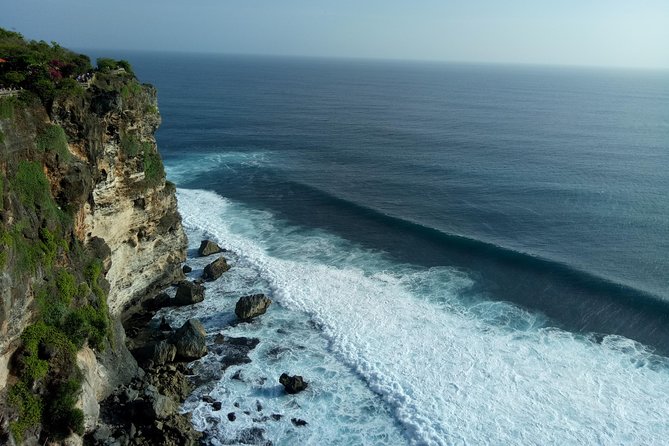 Private Tour Bali Beaches and Uluwatu Temple with Dinner - Pandawa Beach: Rock Views Plus a More Chill Swim Hour