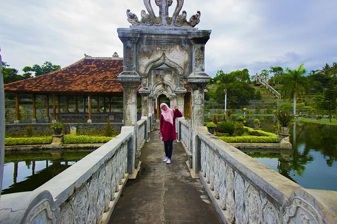 Royal Karangasem Heritage Tour - Tirta Gangga Water Garden: fountains, statues, and 1948-era design