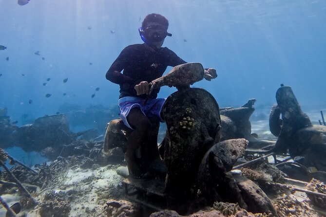 Snorkeling with turtle and statue in Gilis - Key things I’d watch for before you go