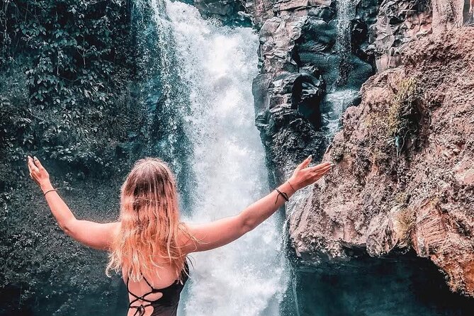Sunset Sailboat Dinner Cruise & Private Ubud highlights Tour. - Kanto Lampo Waterfall: photogenic layers and calmer energy