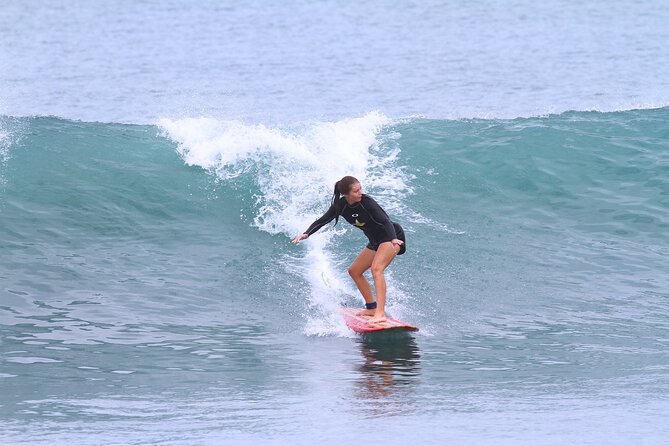 Surf Lesson with a Personal Instructor at Kuta Beach - Tide-timed scheduling and wet-season reality on Kuta Beach