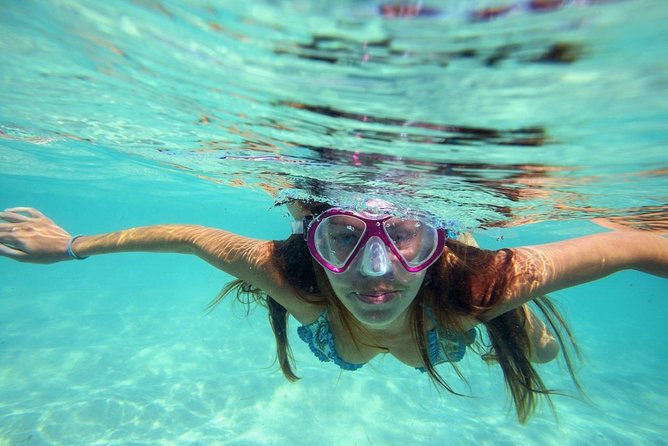 The Best 2-point Snorkeling in Padangbai: Blue lagoon and Tanjung jepun - Tanjung Jepun at 9:00 am: clear water and lots of small fish