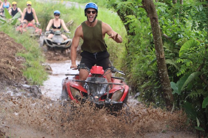 Ubud ATV Quad Bike and Snorkeling at Blue Lagoon Beach - ATV morning on jungle trails: tunnels, waterfalls, rice fields, and river sections