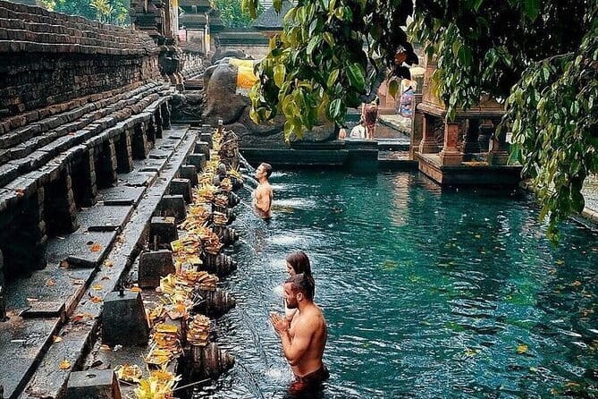 Ubud Hidden Gems Waterfall, Temple and Rice Terraces Private Tour - Tukad Cepung Waterfall: Chasing Sun Through the Cliffs