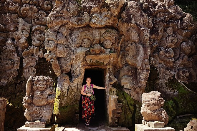 Ubud iconic waterfall and temple tours - Elephant Cave: an 11th century cave heritage temple stop