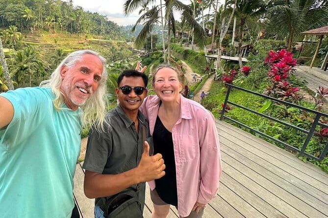 Ubud Monkey Forest Rice Terrace Temple Waterfall Private Tour - Sacred Monkey Forest Sanctuary: how to enjoy the dragon bridge and macaques