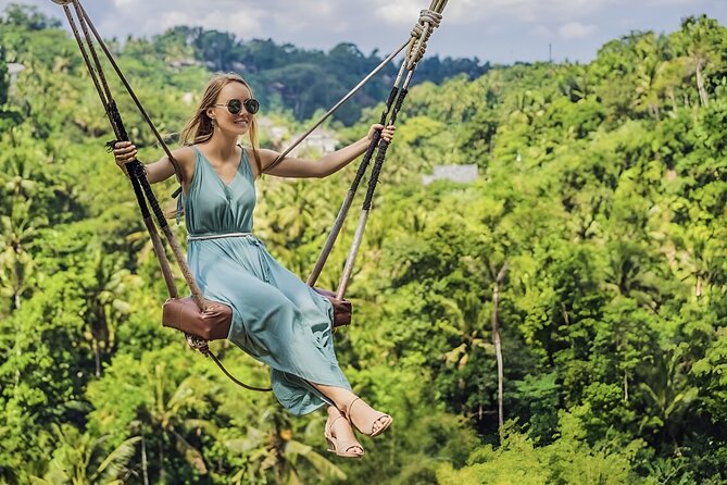 Ubud Tour with Monkey Forest Waterfalls Temples and More - Tirta Empul Temple: holy springs and a water purification ritual