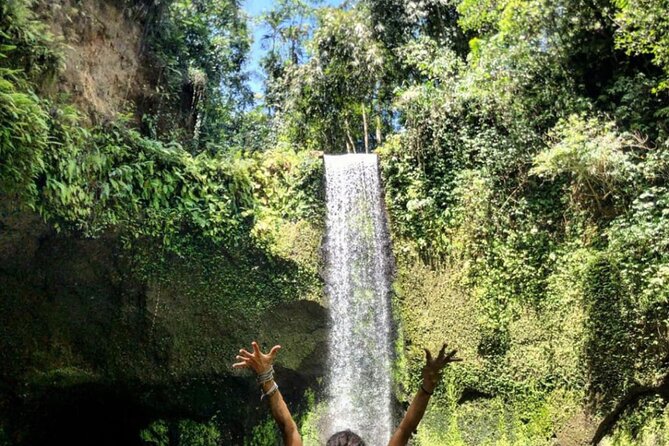 Ubud Waterfalls, Rice Terrace & Jungle Swing - Private Tour - Tukad Cepung Waterfall: cave light makes the trip feel different
