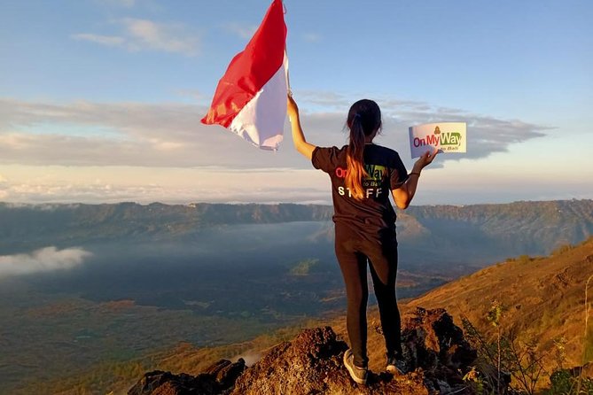 Watch the sunrise from the top of Mount Batur volcano - The summit sunrise: views over Bali, volcano to volcano